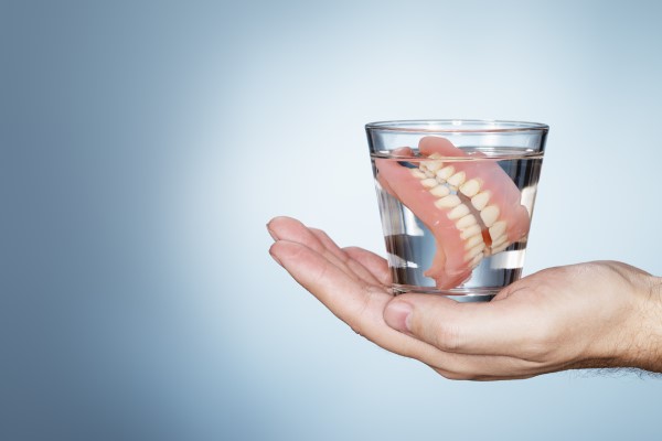 When Would A Dentist Recommend Replacing Old Dentures?